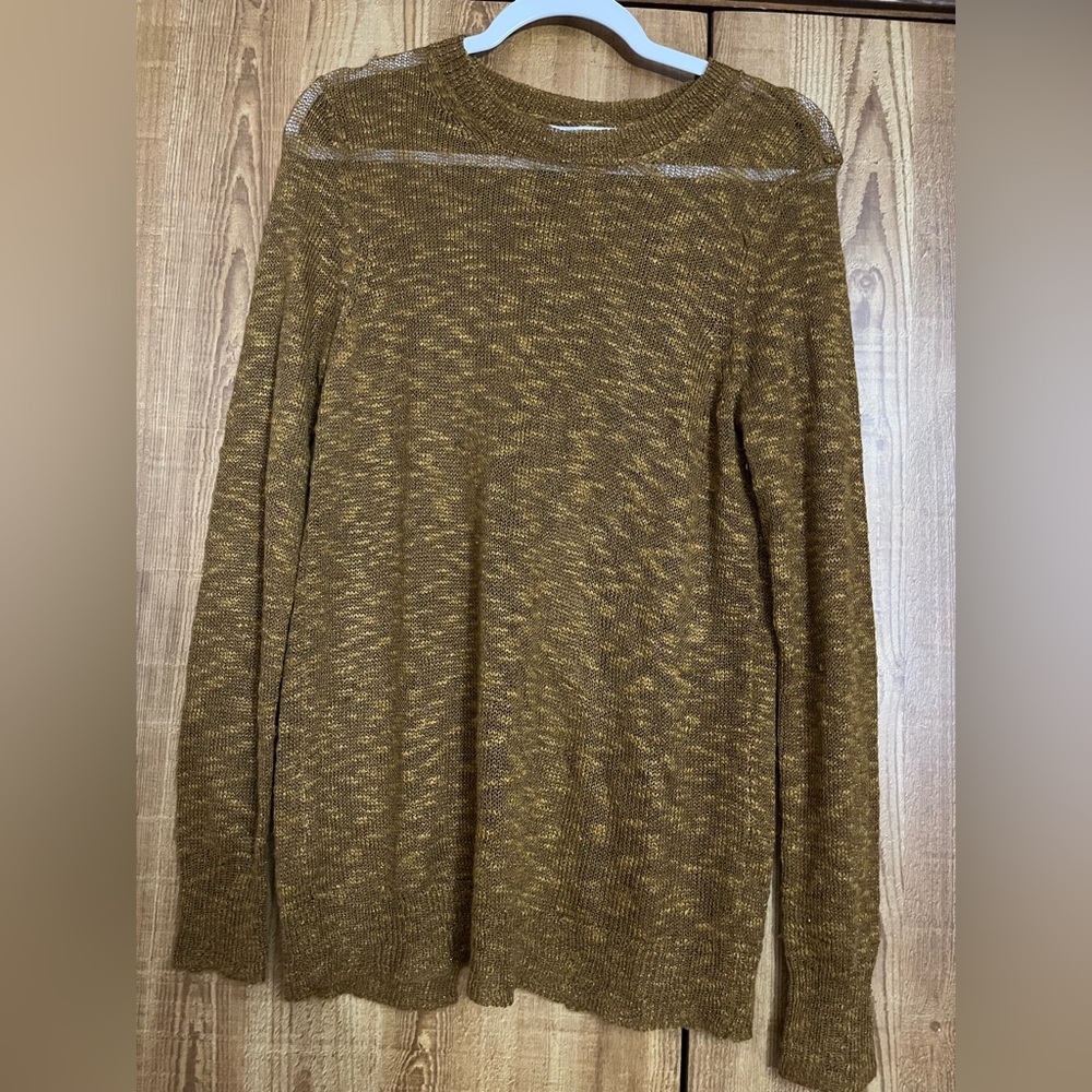 Jennifer Lopez medium gold sweater